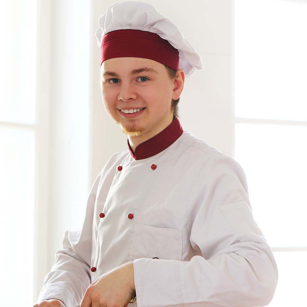 cheerful-chef-on-the-kitchen-78S2ZBN.jpg